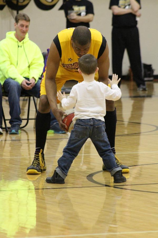One of the Harlem Wizards being a mentor. 