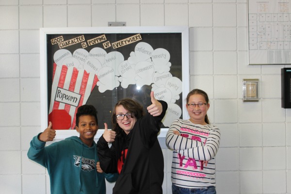 Winners of the second annual Parnassus Halloween writing contest are (from left - right) Blake Sinks (2nd place), Cooper Dale (1st place), and Ella Hudson (3rd place).