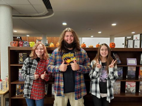 The top three participants in the Parnassus Halloween writing contest were Gabrianna Bruestle (3rd place), Connor Reilly (1st place), and Autumn Mauer (2nd place).