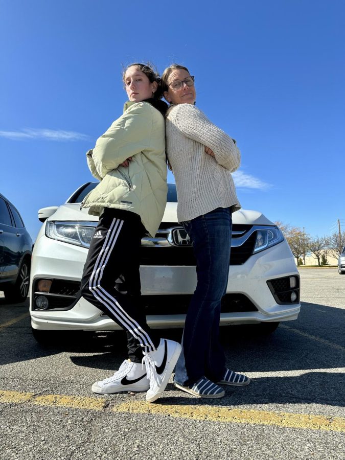 Mia and her mom at the start of their journey across America. 